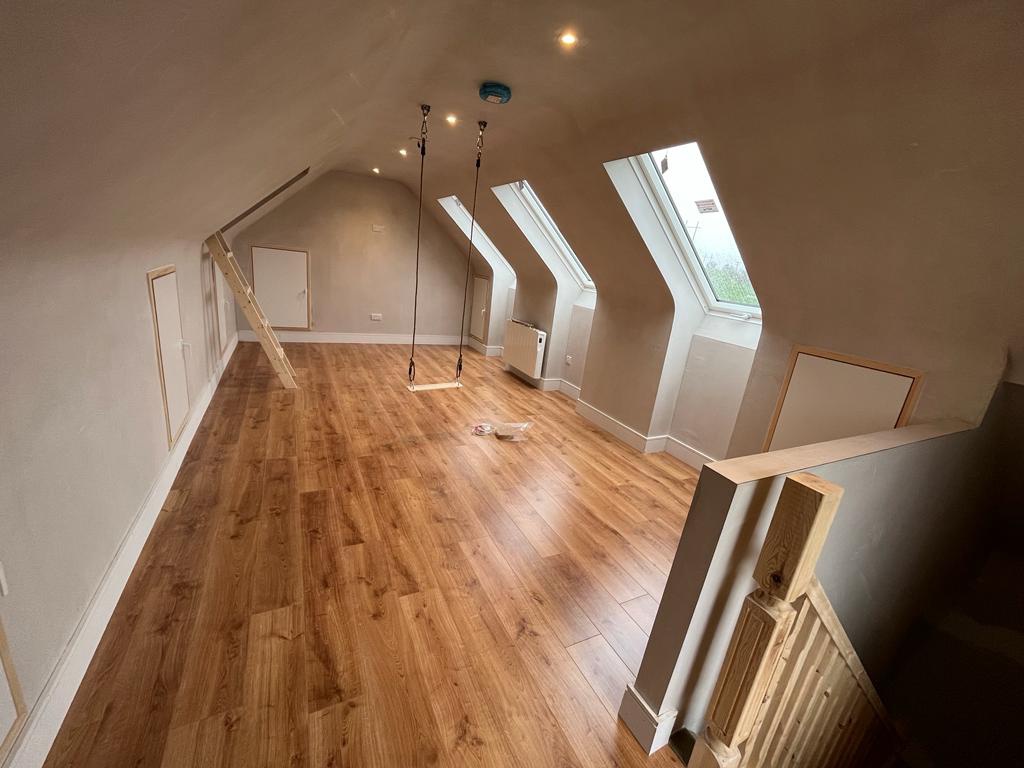 attic conversion with swing